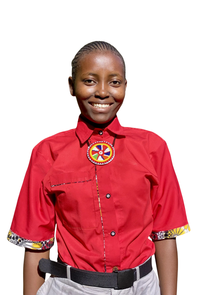 An ADEA student smiling in her red uniform with a Maasai beaded medallion